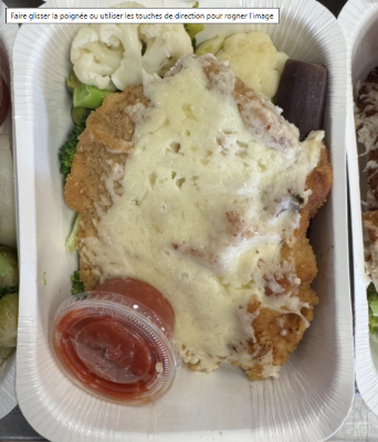 Image de Escalope de veau au parmesan au parmesan, fettuccini et légumes du jour avec sauce tomate
